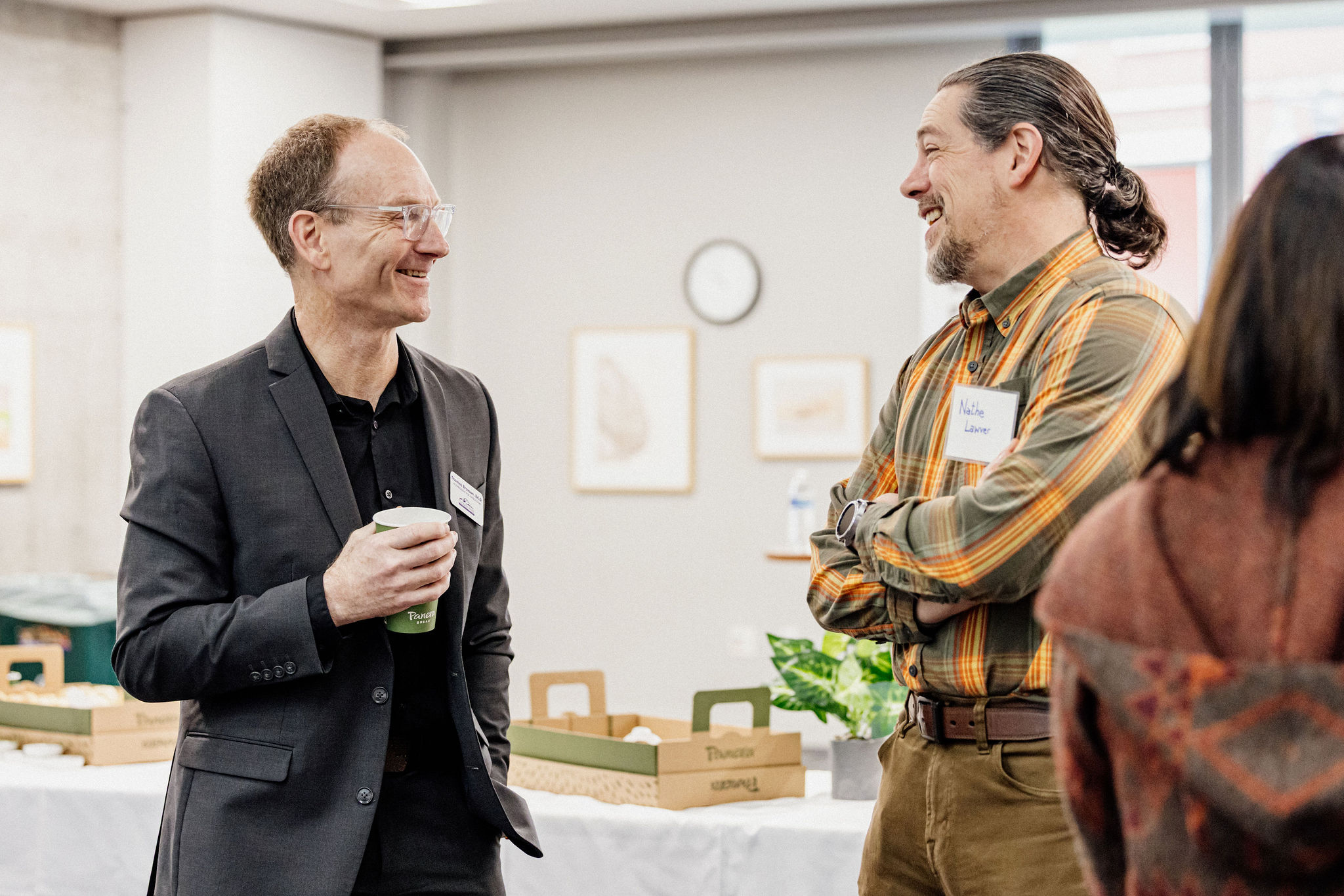 Summit attendees engaged in collaborative discussion